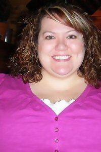 two sensuous plus-size chicks passionately kissing and caressing each other